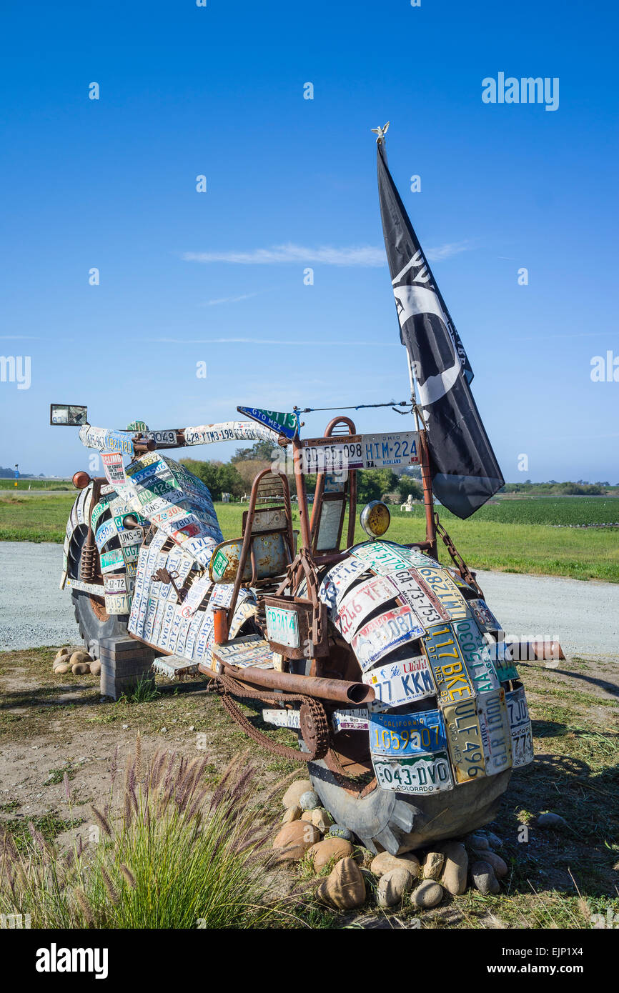 Handmade folk art oversized metal motorcycle sculpture along