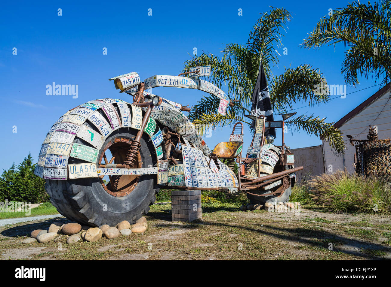 Handmade folk art oversized metal motorcycle sculpture along