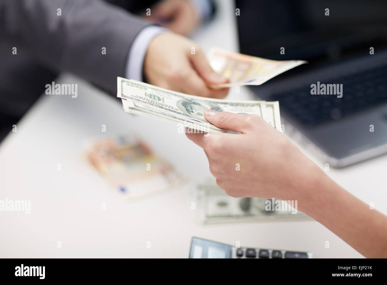 close up of hands giving or exchanging money Stock Photo