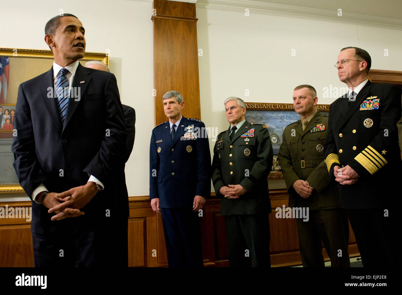 President of the United States Barack Obama, flanked by Gen. Norton Schwartz, U.S. Air Force chief of staff; Gen. George W. Casey, U.S. Army chief of staff; U.S. Marine Gen. James E. Cartwright, vice chairman of the Joint Chiefs of Staff and U.S. Navy Adm. Mike Mullen, chairman of the joint chiefs of staff, addresses the media during his first visit to the Pentagon since becoming commander-in-chief, Jan. 28, 2009. Obama and Vice President Joe Biden met with Secretary of Defense Robert M. Gates and all the service chiefs getting their inputs on the way ahead in Afghanistan and Iraq.  Mass Commu Stock Photo