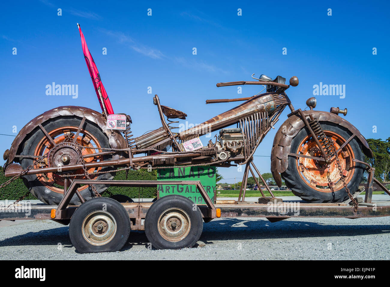 Handmade folk art oversized metal motorcycle sculpture along
