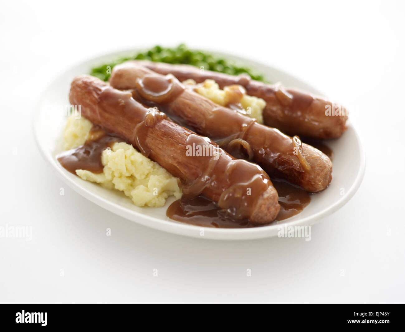 sausage onion gravy mashed potato and peas Stock Photo Alamy