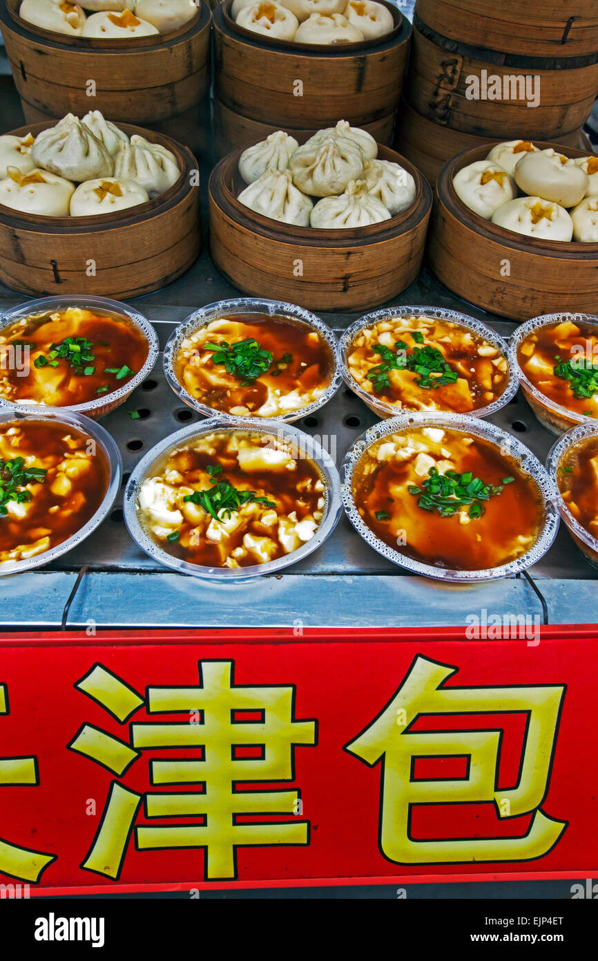 China, Beijing, Wanfujing Street night market, various traditional dishes for sale Stock Photo