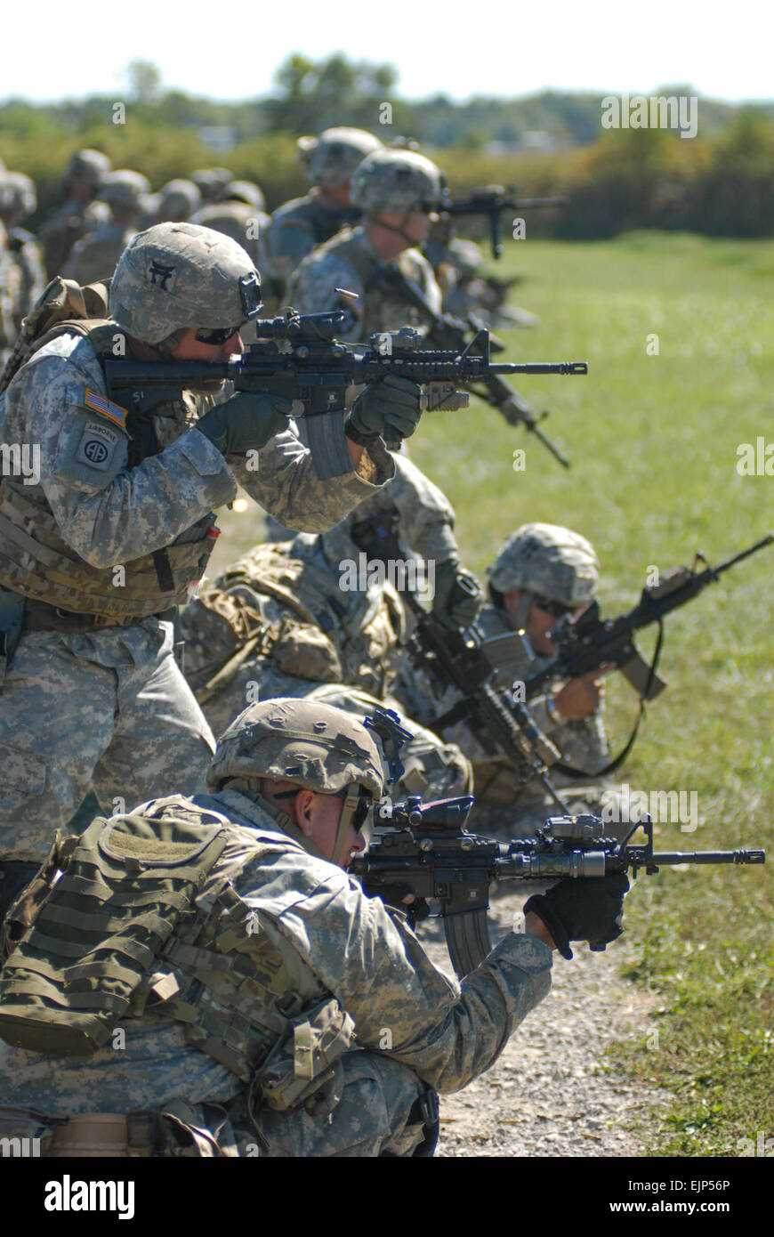 Noncommissioned officers from 1st Battalion, 187th Infantry Regiment, 3rd Brigade Combat Team, 101st Airborne Division Air Assault, engage targets during an NCO professional development training event at Fort Campbell, Kentucky, Sept. 23, 2014. The Soldiers were trained on non-traditional firing practices to allow them a greater depth of marksmanship knowledge to impart to their teams and squads. Spc. Eric Provost, 3rd BCT Public Affairs Stock Photo