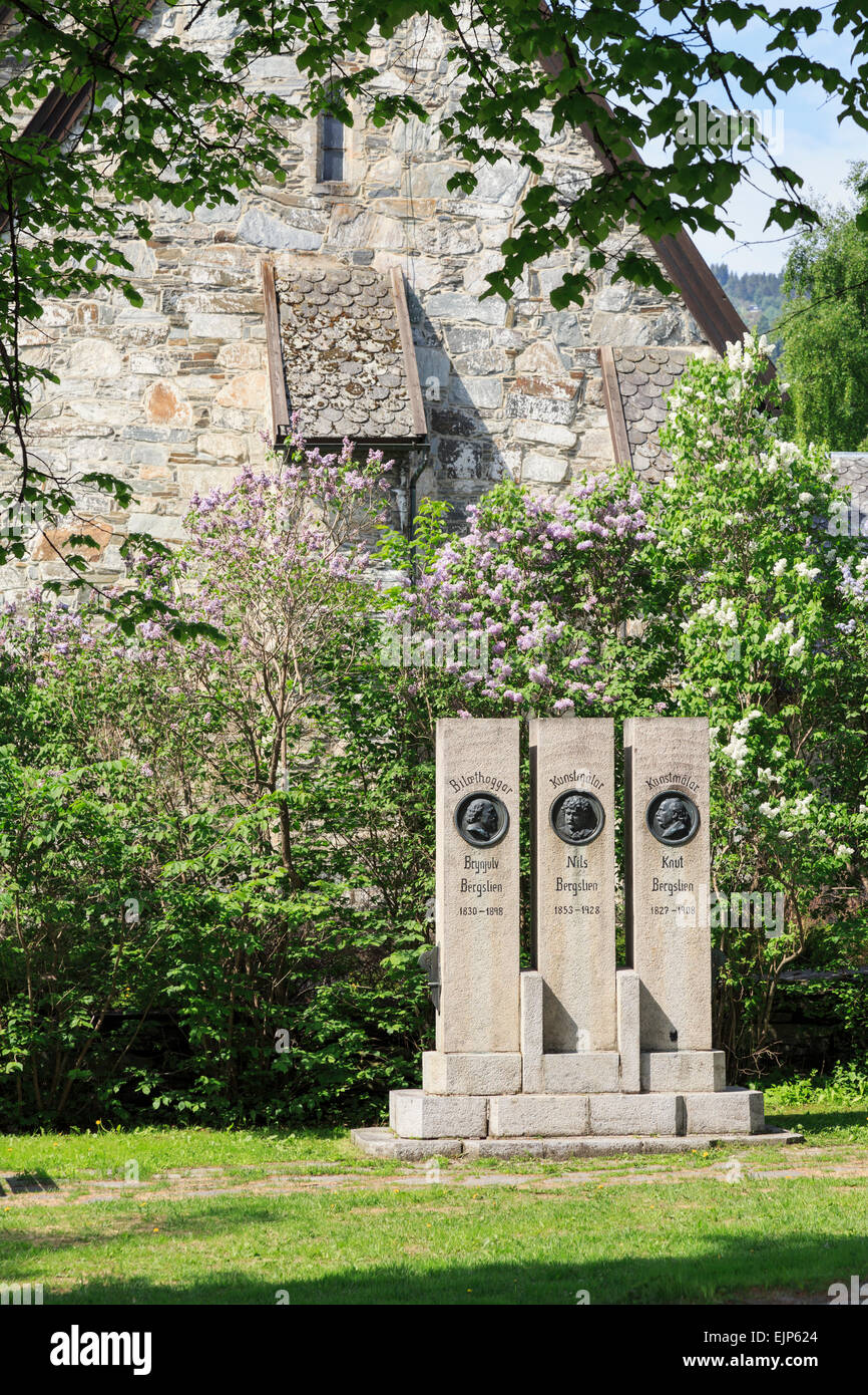 Monument honoring three artists, Brynjulf, Knud and Nils Bergslien in Bergslien Park outside church in Voss, Hordaland, Norway Stock Photo