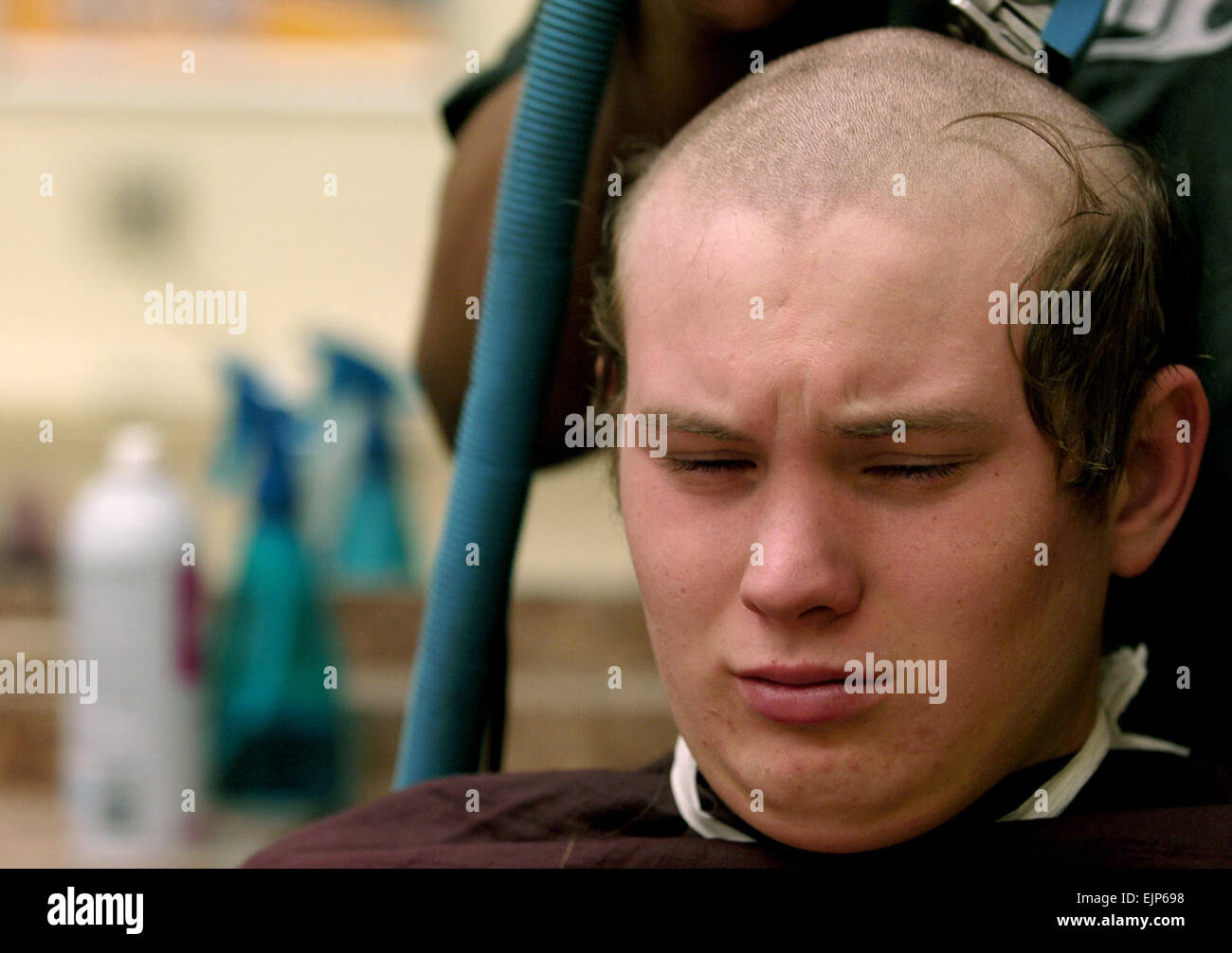 u.s. army pvt. hampton logan receives his initial haircut during