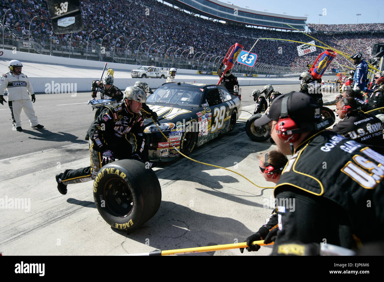 The Stewart-Haas pit crew works on the Army Chevrolet Impala SS Sunday at Bristol Motor Speedway as Ryan Newman drives to a seventh-place finish. Stock Photo