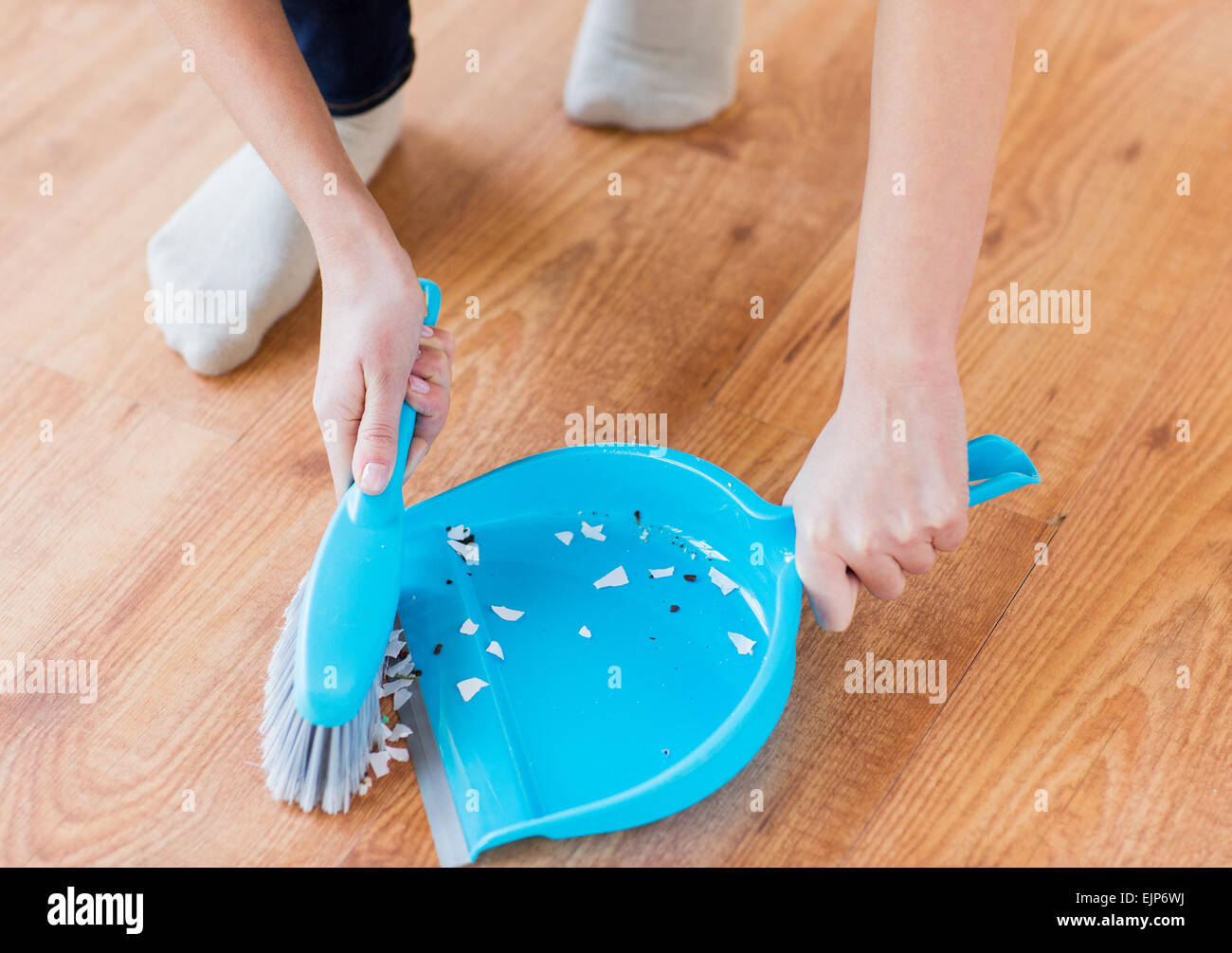 Woman sweeping floor hires stock photography and images Alamy