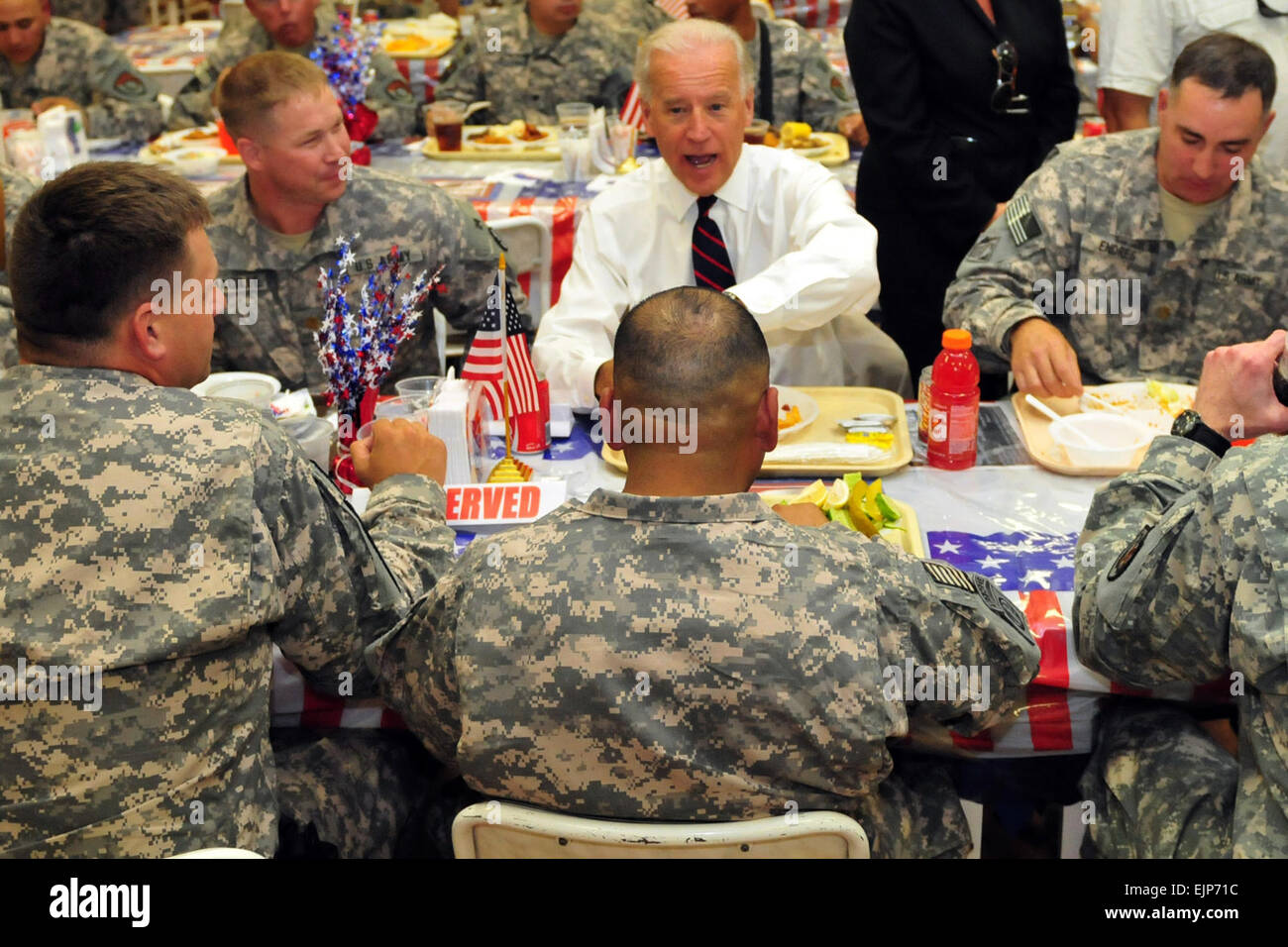 Vice President Joe Biden eats lunch and chats with soldiers at the Sports  Oasis dining facility on Camp Victory, Iraq, July 4, 2010. Biden and his  wife, Dr. Jill Biden, spent Independence