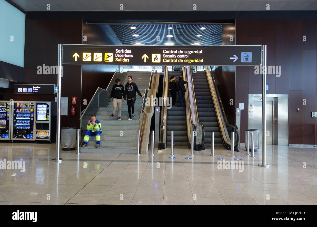 Stairs and escalators to departures inside Terminal 2 C, El Prat Airport,  Barcelona, Catalonia, Spain Stock Photo - Alamy