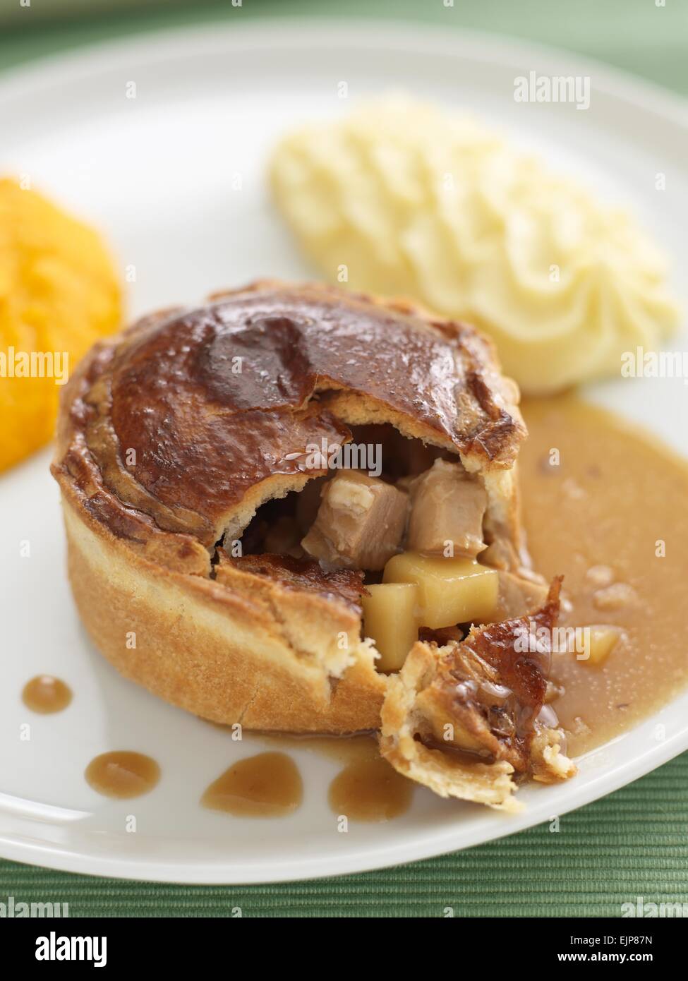 Meat and potato pie and swede Stock Photo