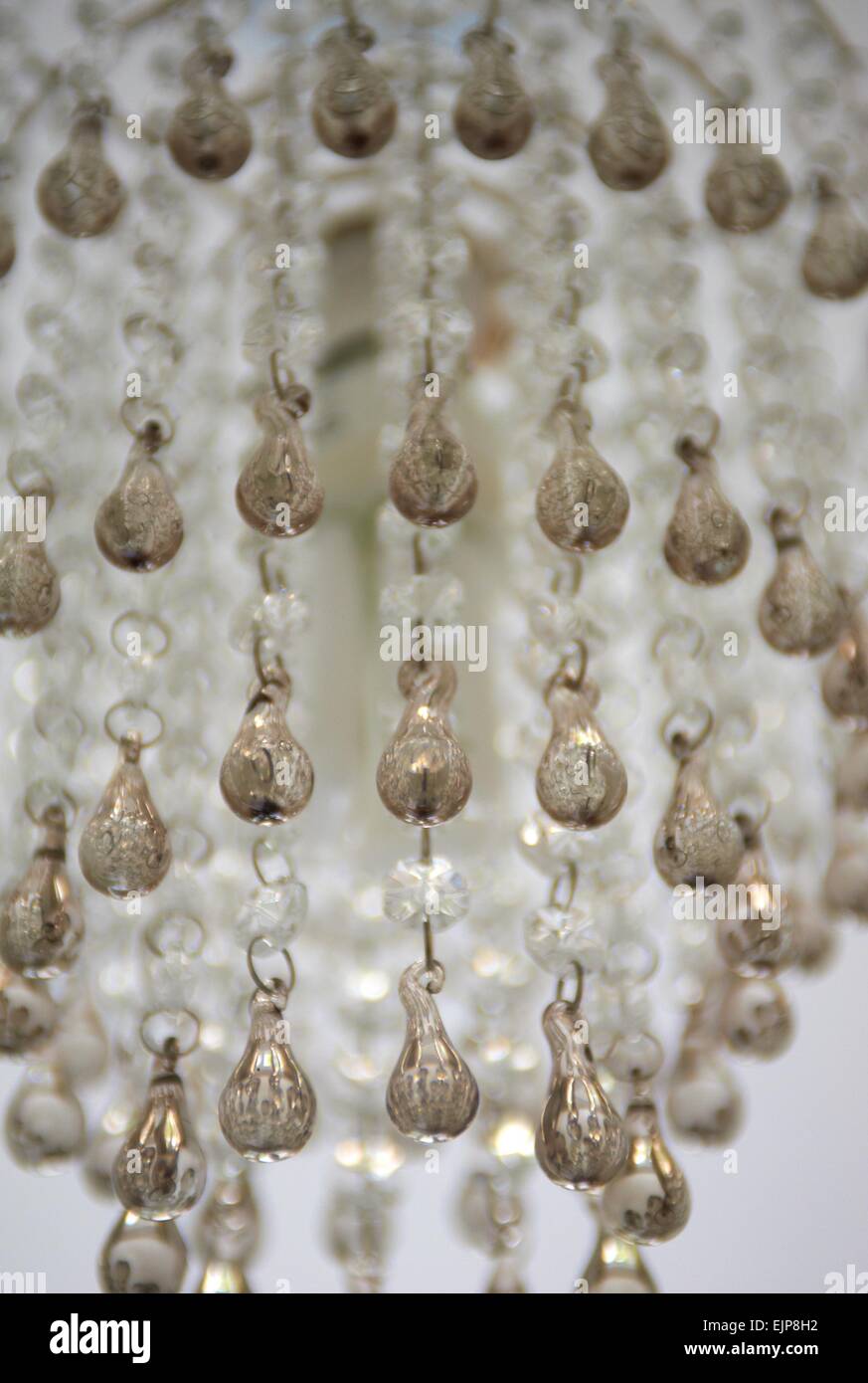chandelier light lamp shade house glow bright glass bejeweled jewels crystal sparling elegant sparkle twinkle diffract difractio Stock Photo