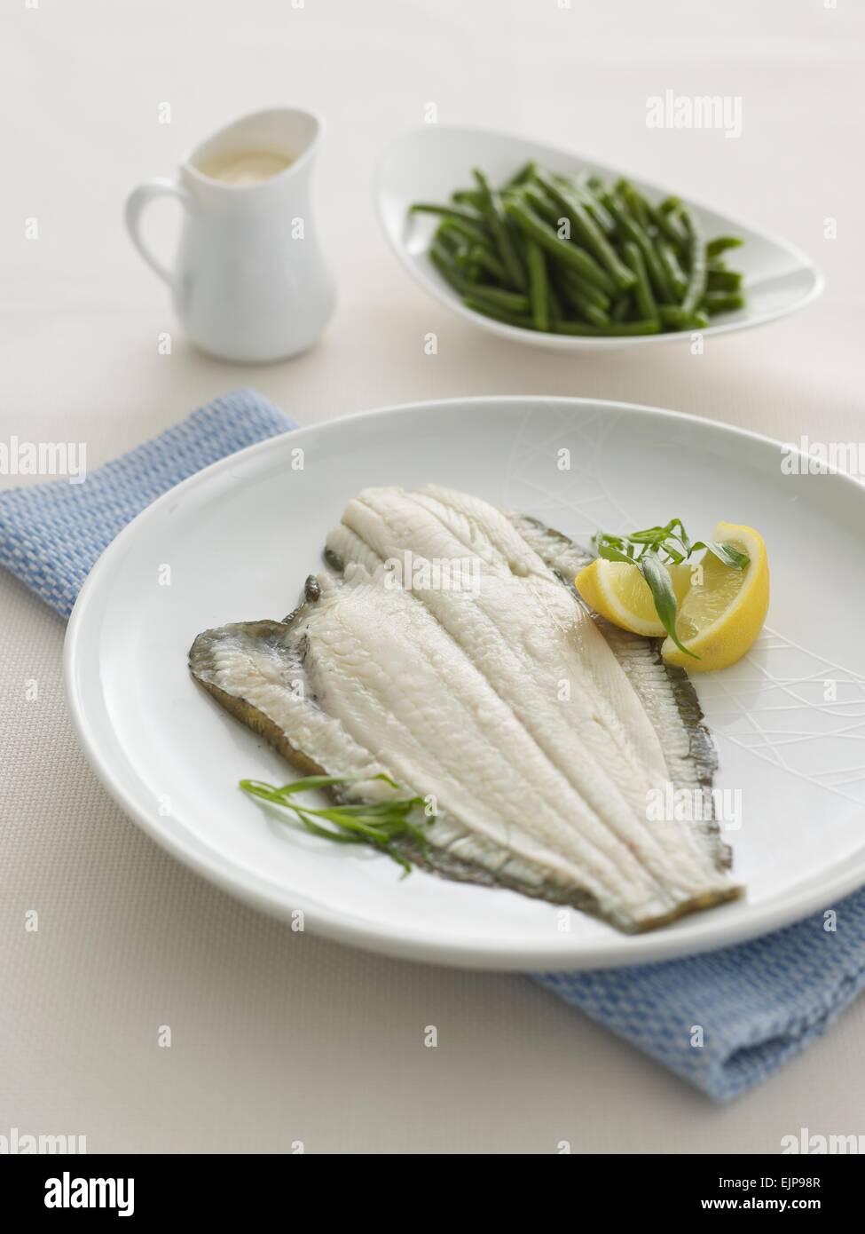 Simple plain Fillet of plaice spinach and bechamel sauce lemon tarragon