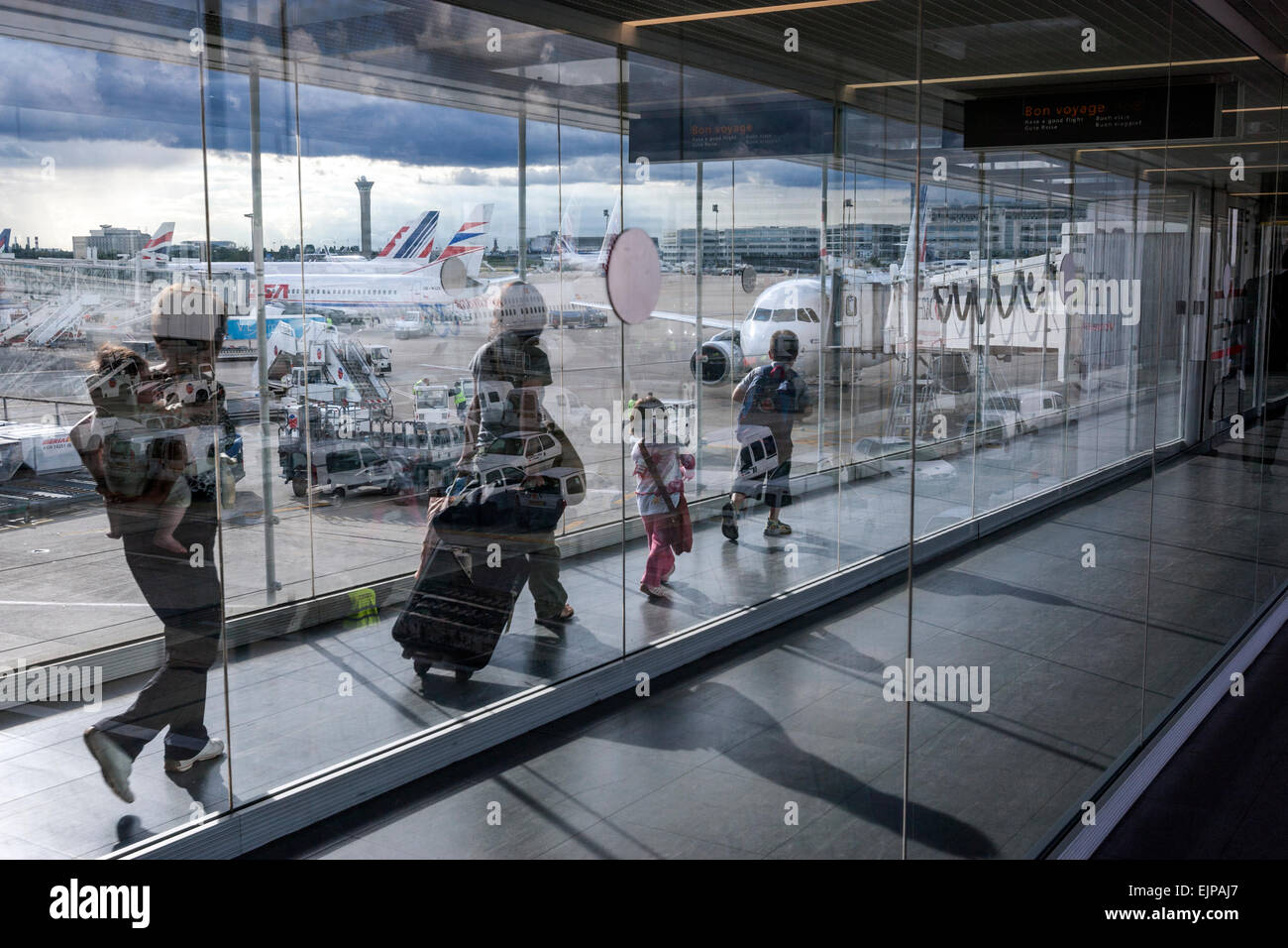 Arrival passengers walking Charles de Gaulle Airport Terminal 2F