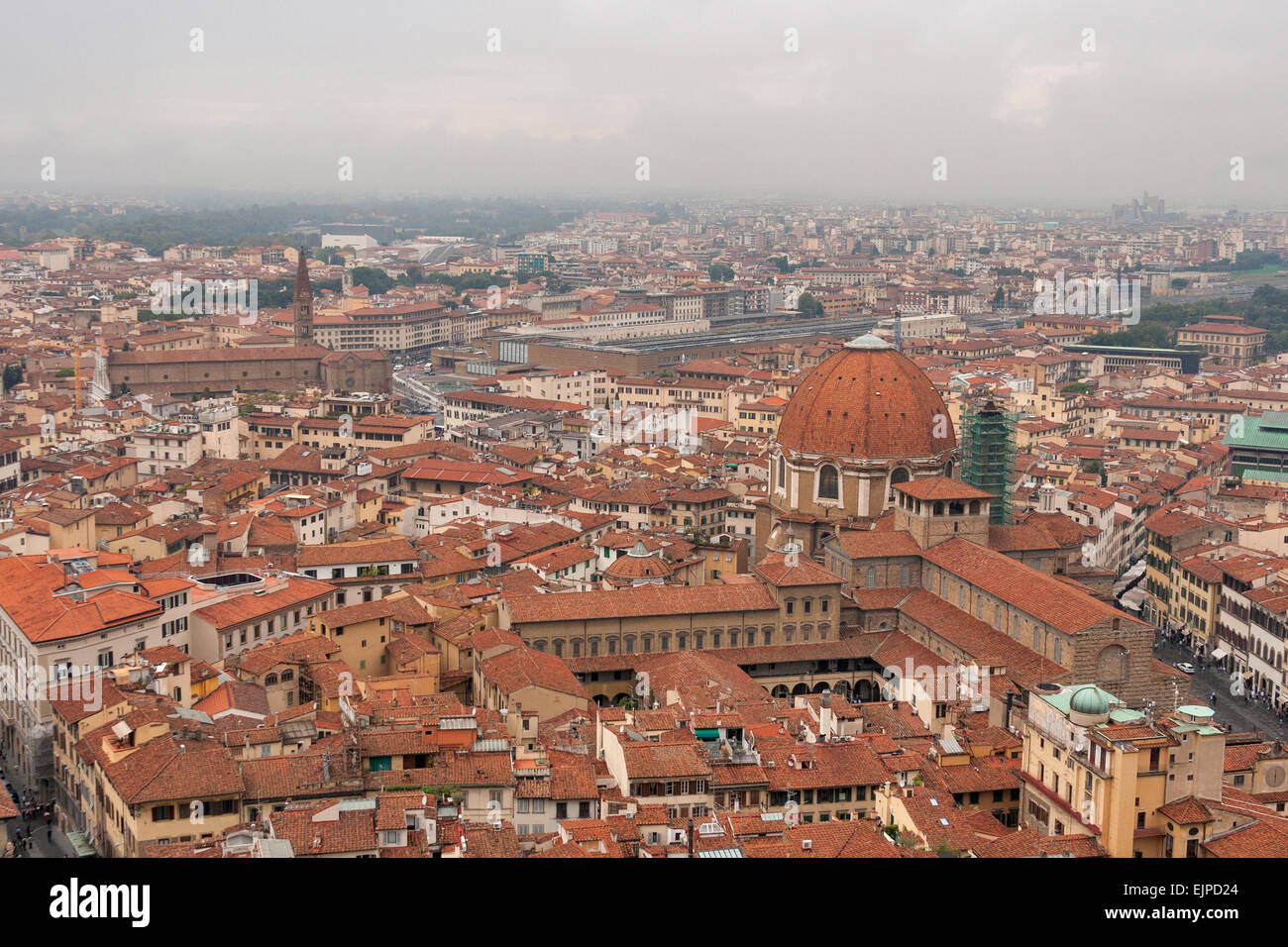 Florence cityscape with railroad station in the fog. Aerial view. Italy. Stock Photo