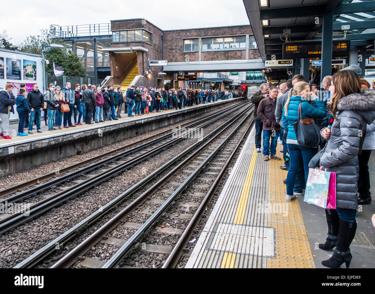 Wembley Park Station. Large Crowd waiting for tube train, after a Rugby Match at Wembley Stadium.. Stock Photo