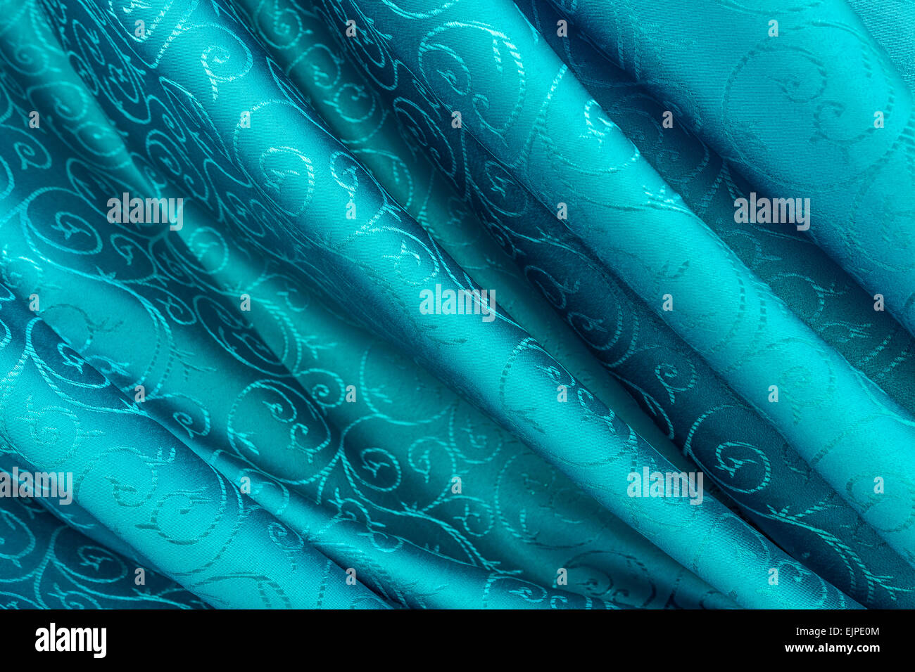 Light blue silk curtain with motifs Stock Photo Alamy