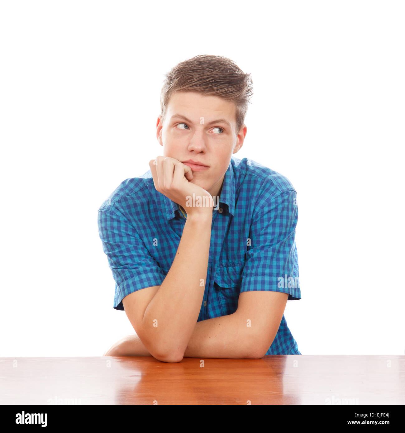 Teen boy thinking Stock Photo