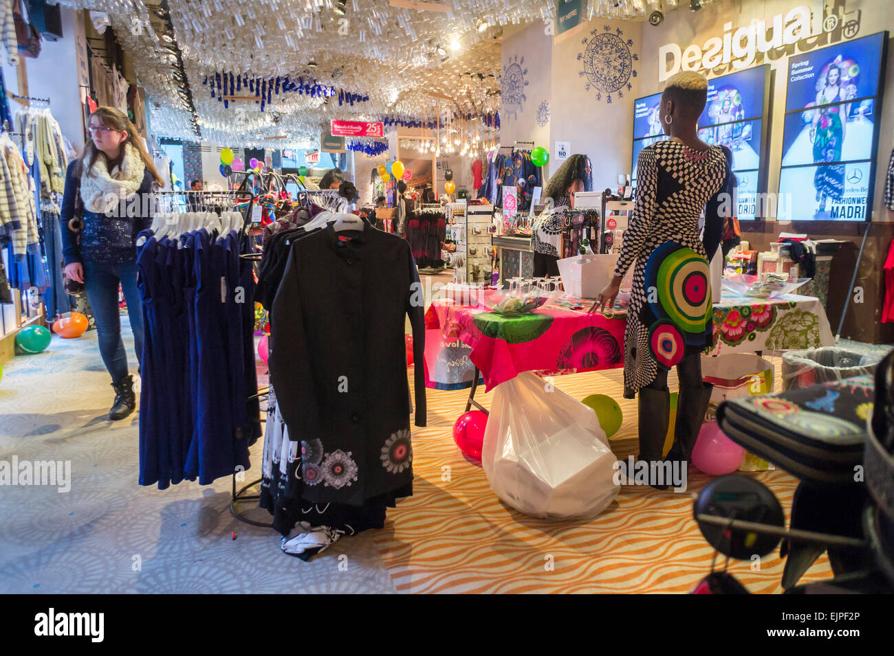 Shopping inside a Desigual store on Fifth Avenue in New York during a  promotional event on Saturday, March 21, 2015. (© Richard B. Levine Stock  Photo - Alamy