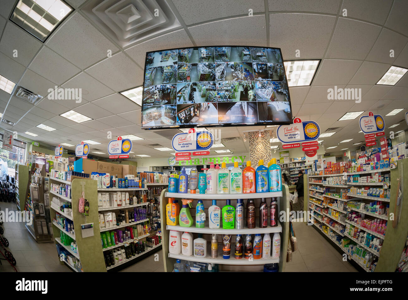 A monitor shows the video feeds of security cameras of a drug store in New  York on Monday, March 23, 2015. (© Richard B. Levine Stock Photo - Alamy