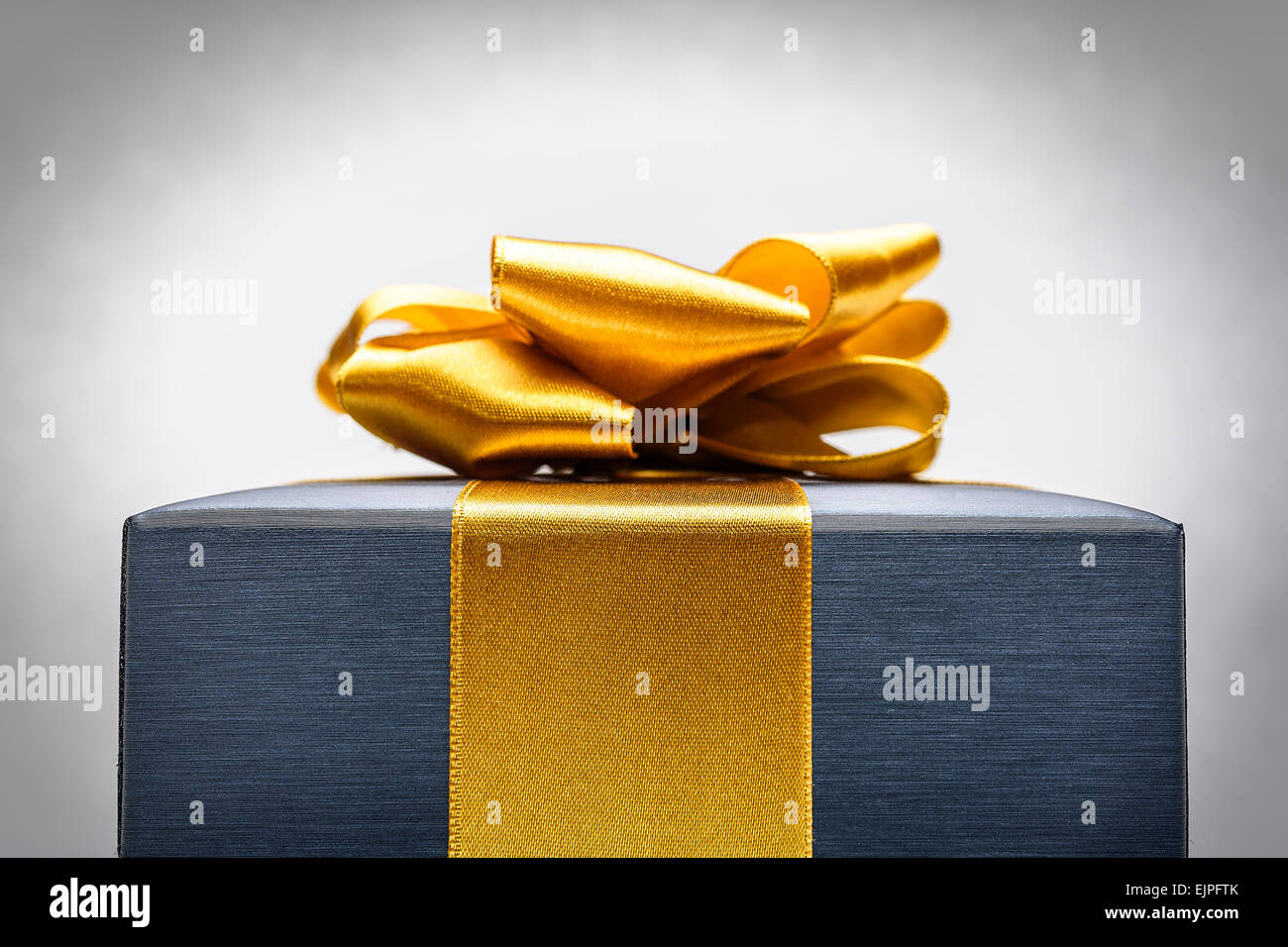 Gift box with ribbon Stock Photo - Alamy