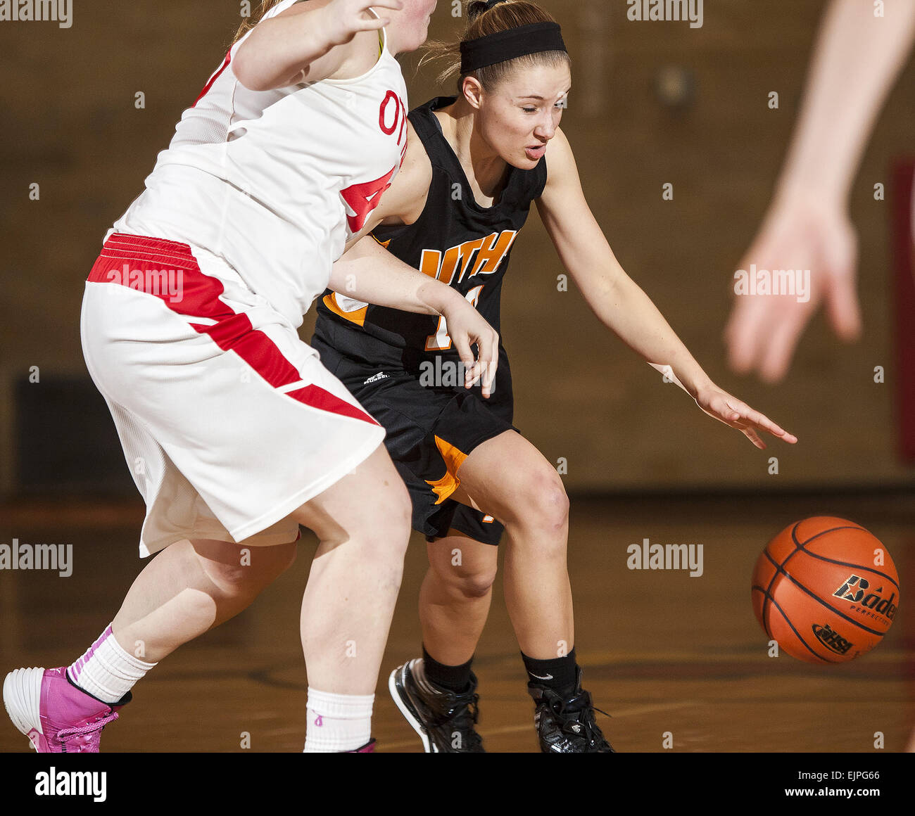 Rock Island, Iowa, USA. 19th Feb, 2014. United Townships Tayler Walker drives past Ottawa's Jill Wignes in the girls Class 4A Regional at Rock Island High School. Published Nov. 18, 2014. United Township guard Tayler Walker is one of four returning starters for the Panthers. She led the Big Six in scoring last year, averaging 14 points per game. © Quad-City Times/ZUMA Wire/Alamy Live News Stock Photo