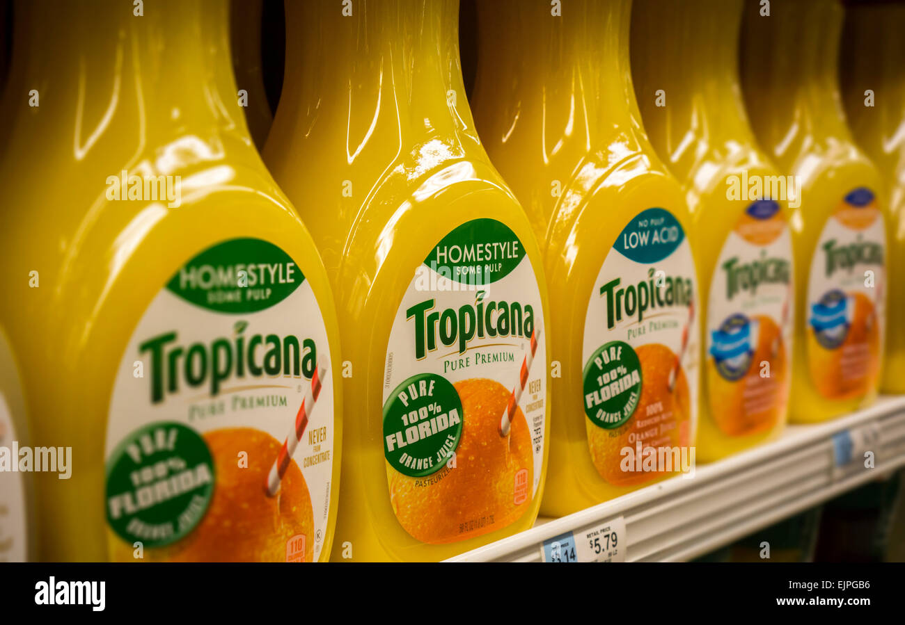 Containers of Tropicana orange juice from Florida are seen in a supermarket refrigerator case in New York on Wednesday, March 25, 2015. Orange juice futures posted the largest rally in 16 years as drier than normal weather combined with the citrus greening disease will cause Florida to have the smallest crop in 40 years. Florida is the second largest orange juice manufacturer after Brazil. (© Richard B. Levine) Stock Photo