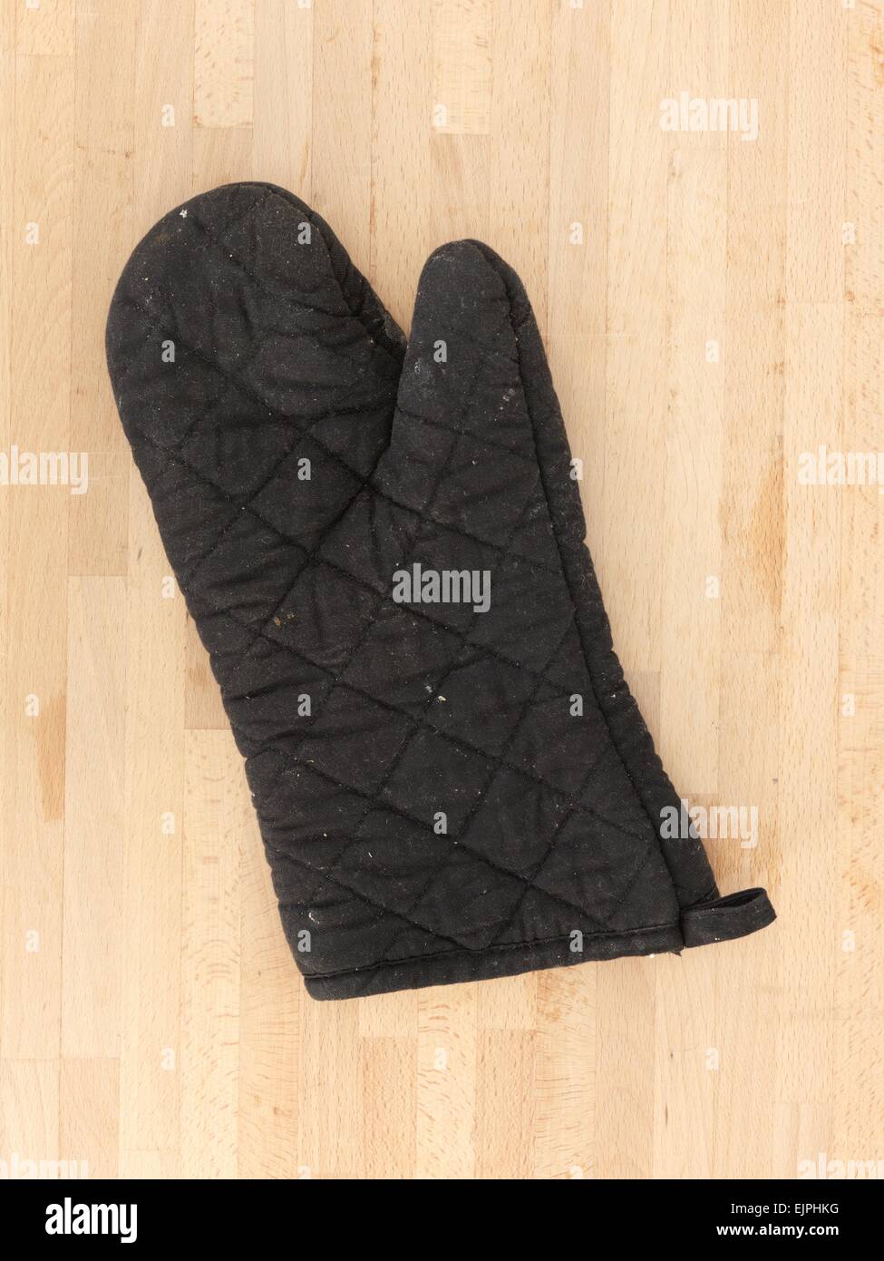 A close up shot of an oven mitt Stock Photo