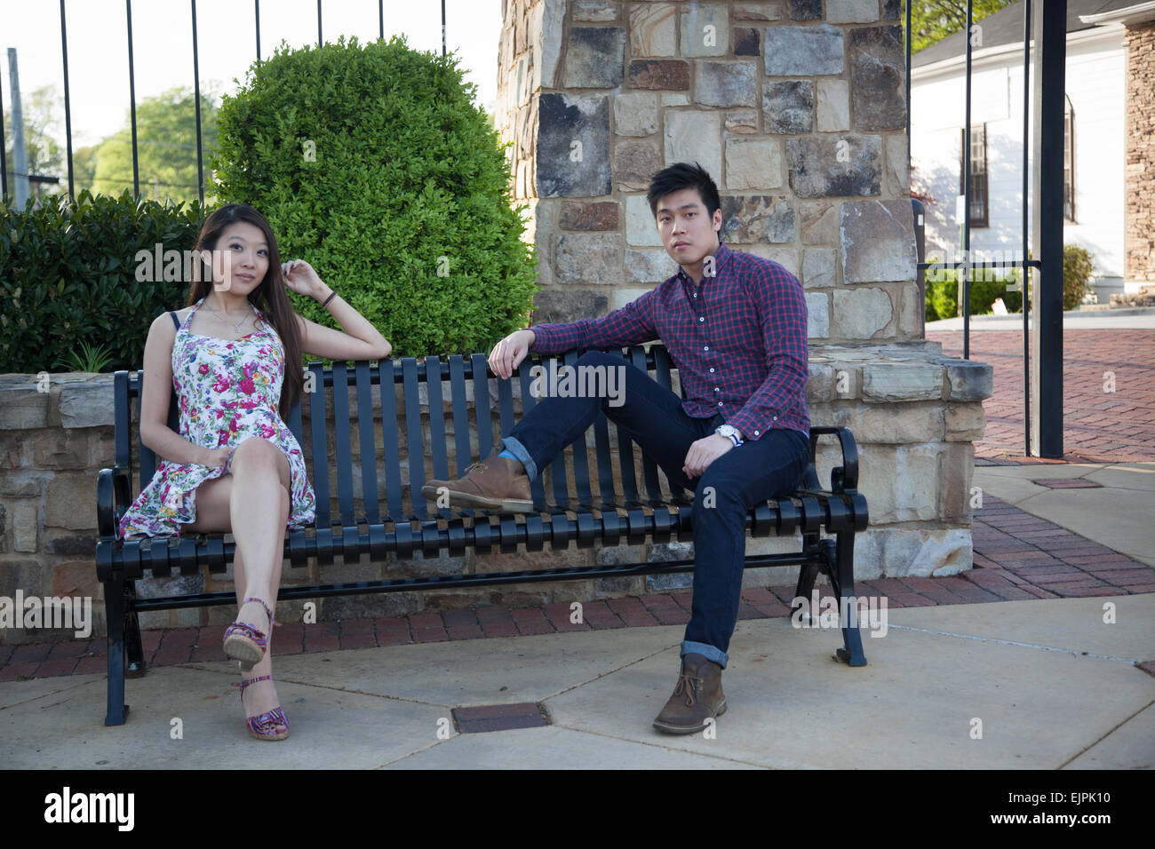 Asian woman man sitting hi-res stock photography and images - Alamy