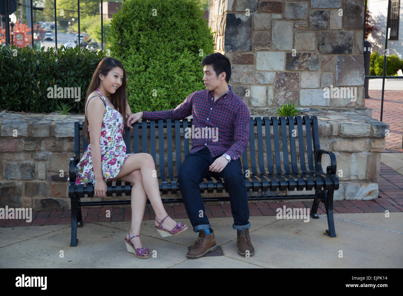 Woman sitting on man hi-res stock photography and images - Alamy