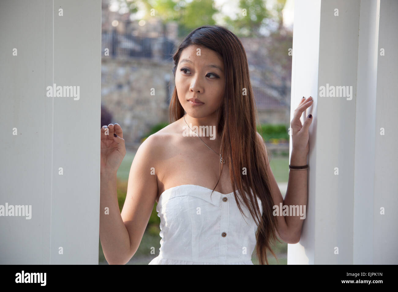 Pretty Asian woman in a white dress, Stock Photo
