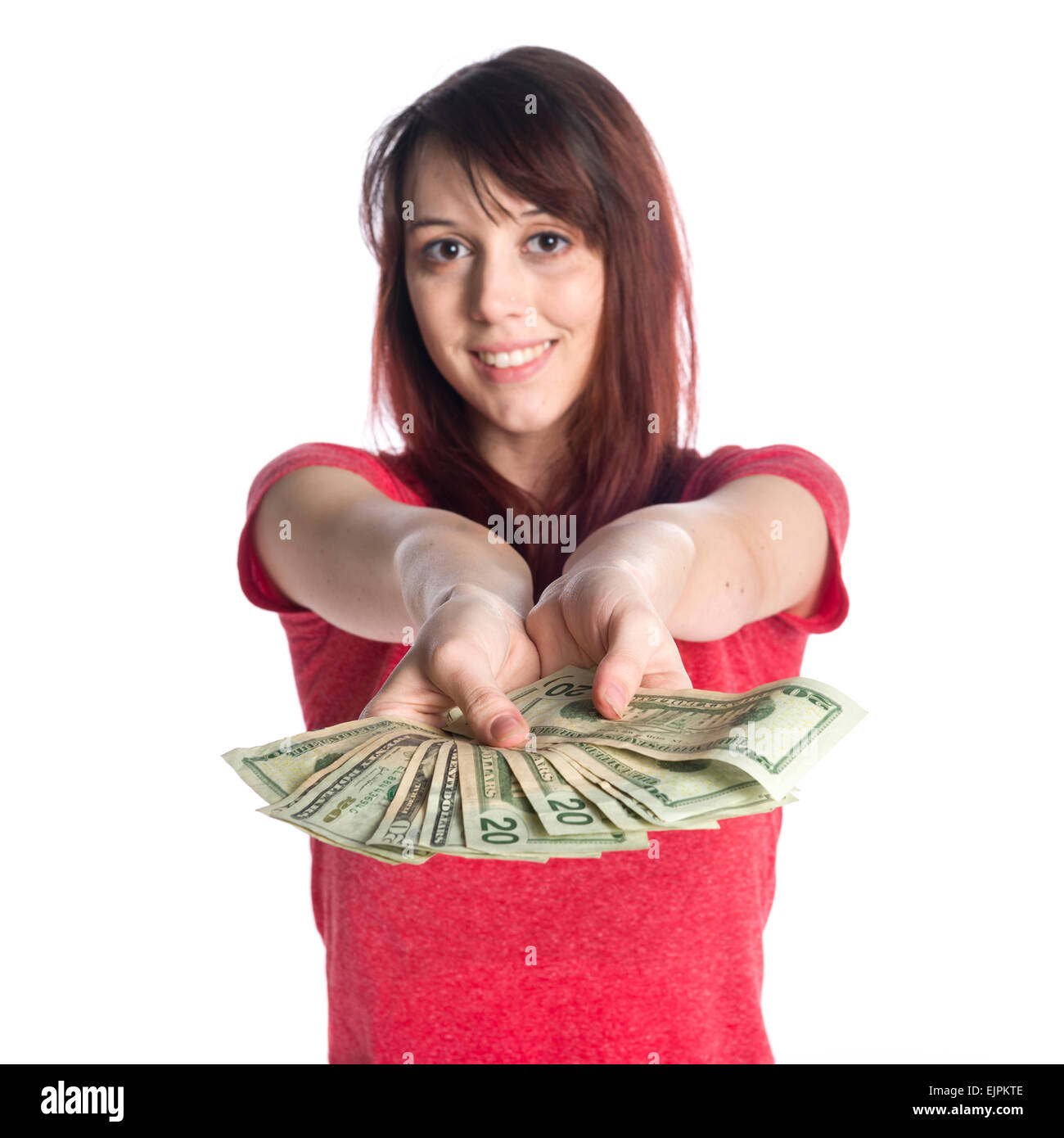 Smiling Woman Offering a Fan of 20 US Dollar Bills Stock Photo