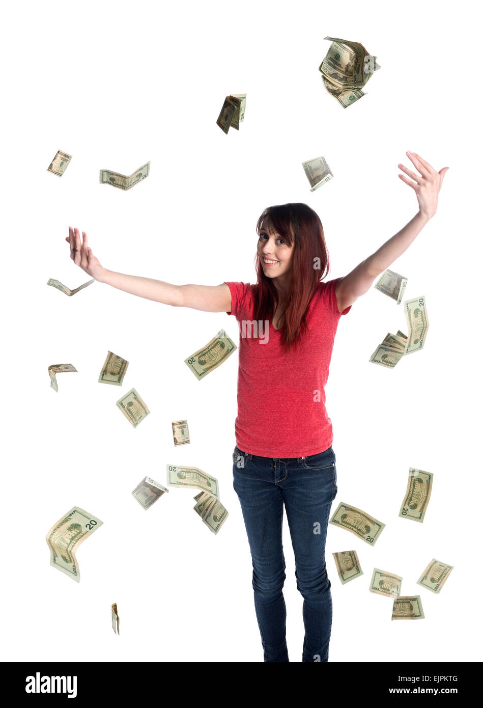 Happy Woman Throwing US Dollar Paper Bills Up Stock Photo