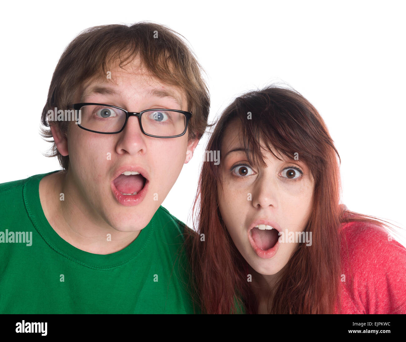 Shocked Couple with Mouth Open Looking at Camera Stock Photo