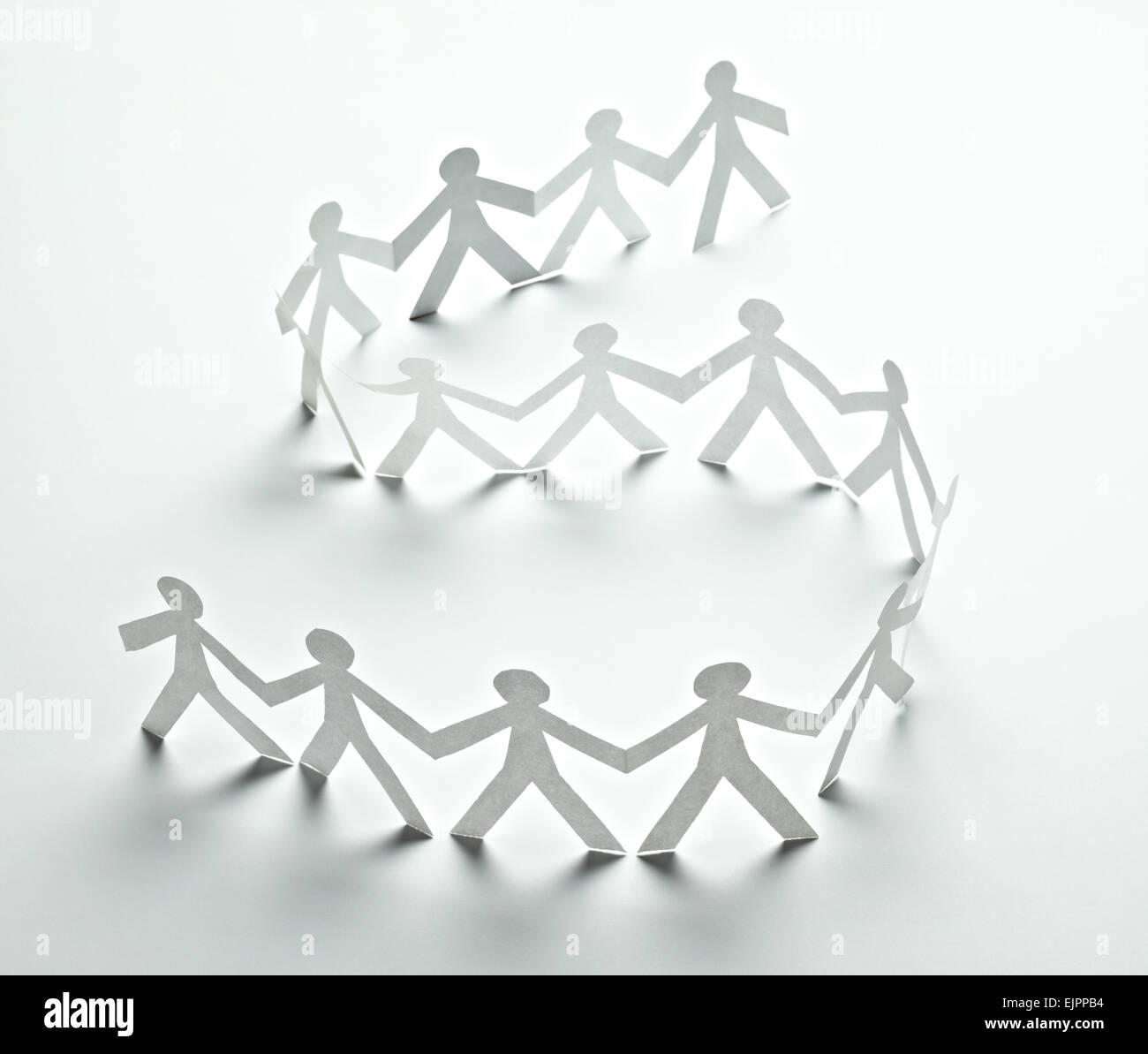 close up of paper people on white background Stock Photo - Alamy