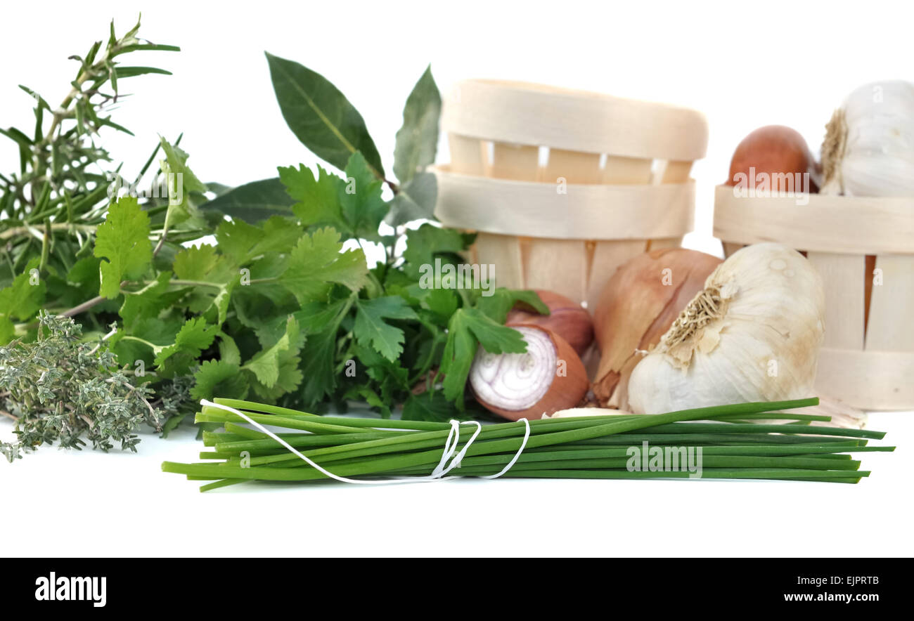 different aromatic herbs onion, garlic and shallots on white background Stock Photo