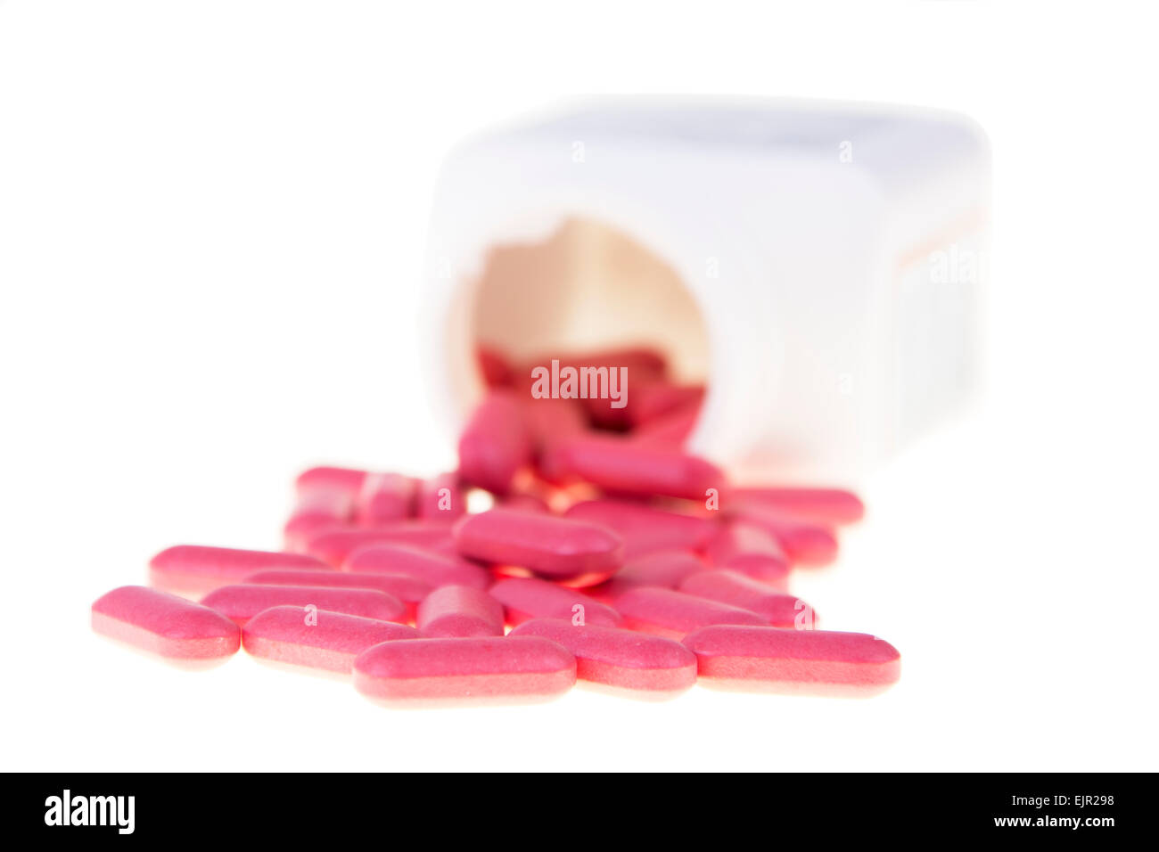 pink vitamin isolated on white background Stock Photo