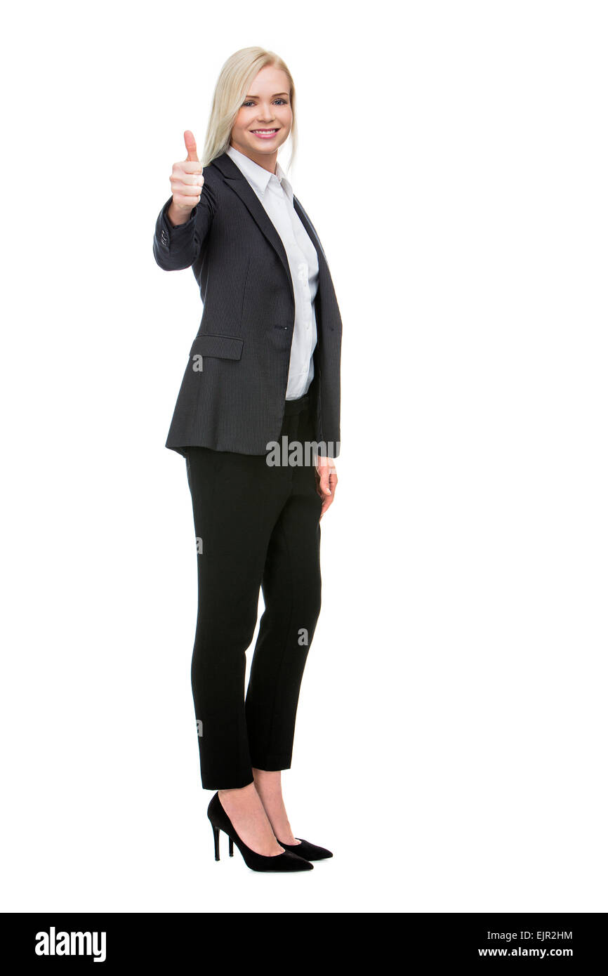 smiling blonde businesswoman thumb up with one hand Stock Photo