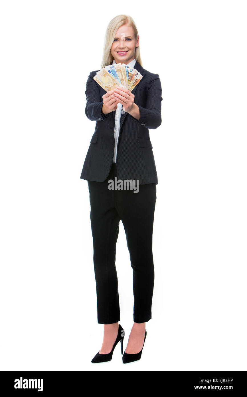 blonde businesswoman smiling and holding money Stock Photo