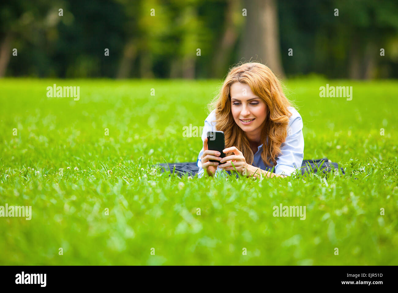 Blonde woman park hi-res stock photography and images - Alamy