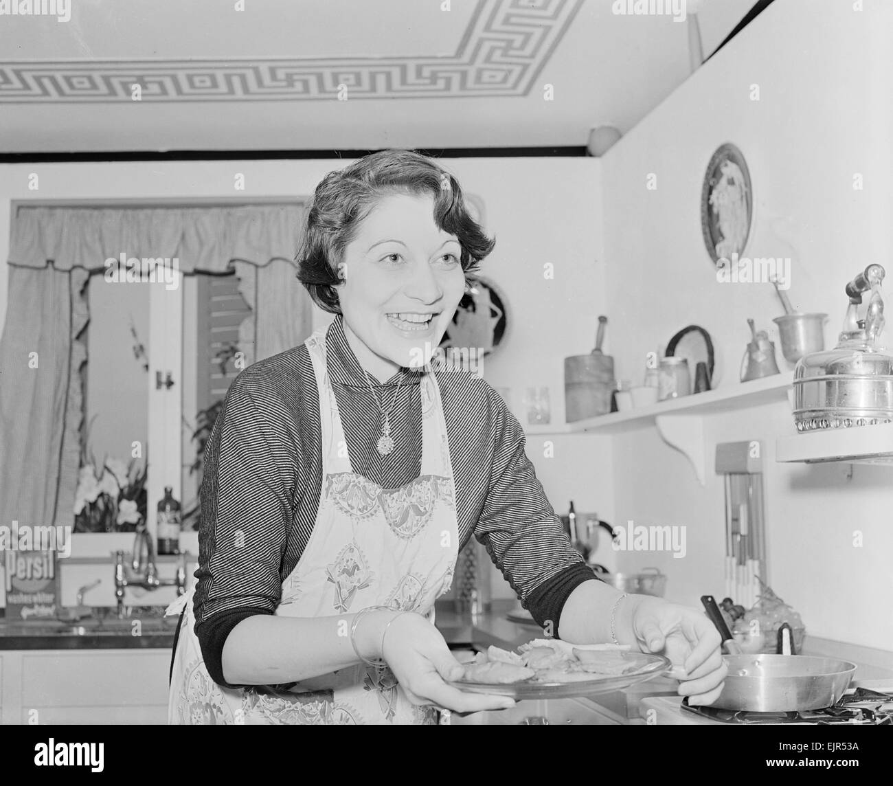 International Cookery Exhibition at the Royal Festival Hall Greek housewife and cook Demetra Pavlidou seen here in the kitchen giving a demonstration in Greek cuisine. 6th November 1952 *** Local Caption *** watscan - - 21/01/2010 Stock Photo