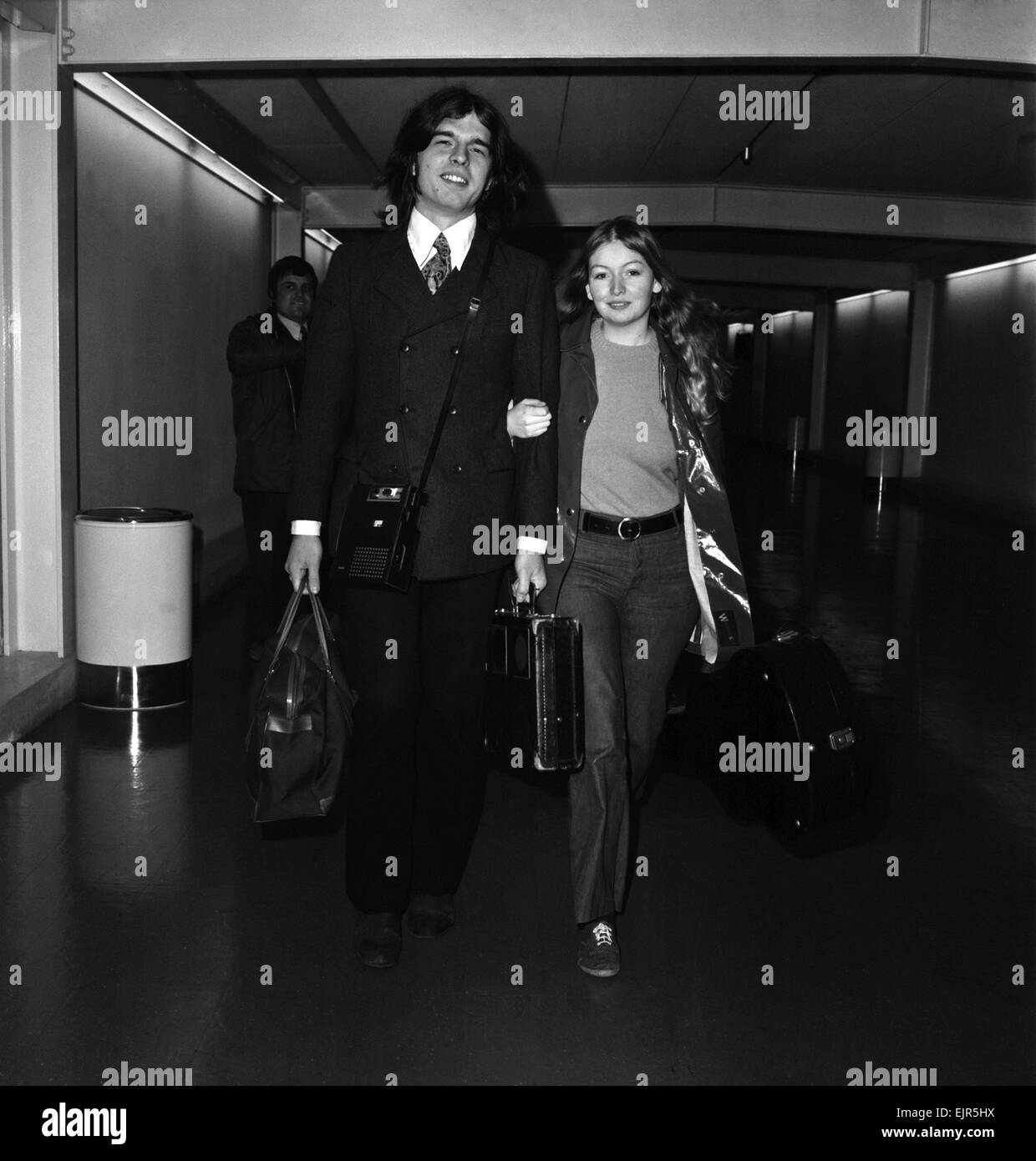 Singer Mary Hopkin and her record producer husband Tony Visconti seen here leaving Heathrow airport for a months tour of New Zealand. January 1972 72-0066 Stock Photo