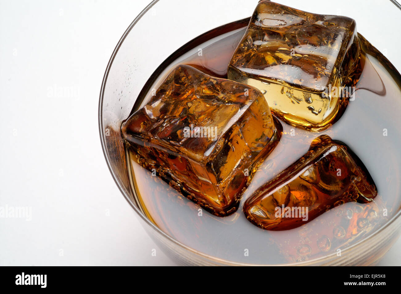 Glass of cola drink with ice closeup Stock Photo