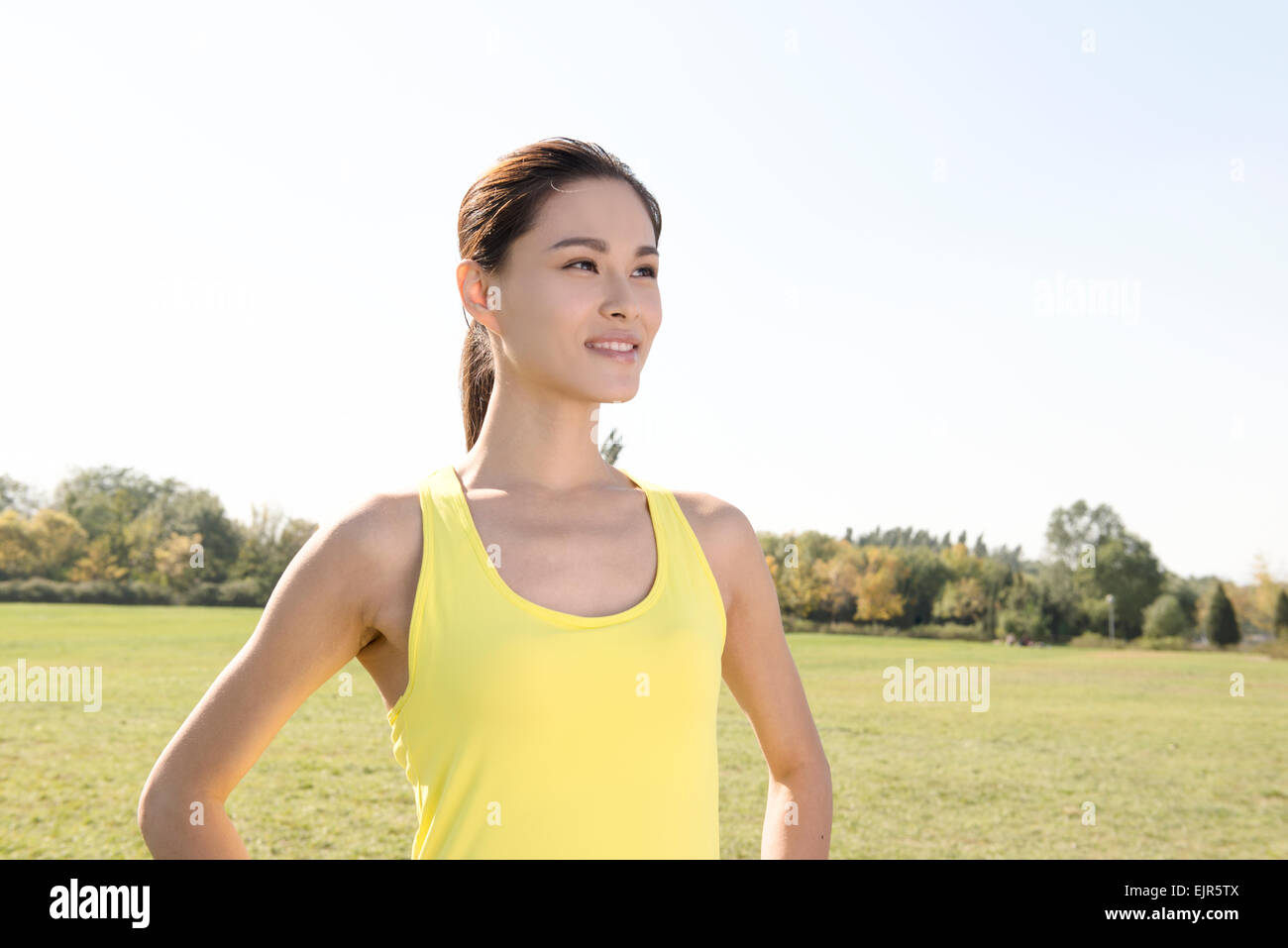 Portrait of young woman exercising Stock Photo - Alamy