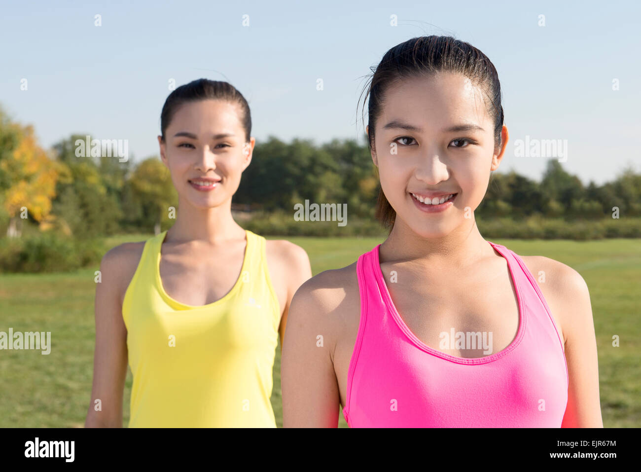 Portrait of young women exercising Stock Photo - Alamy