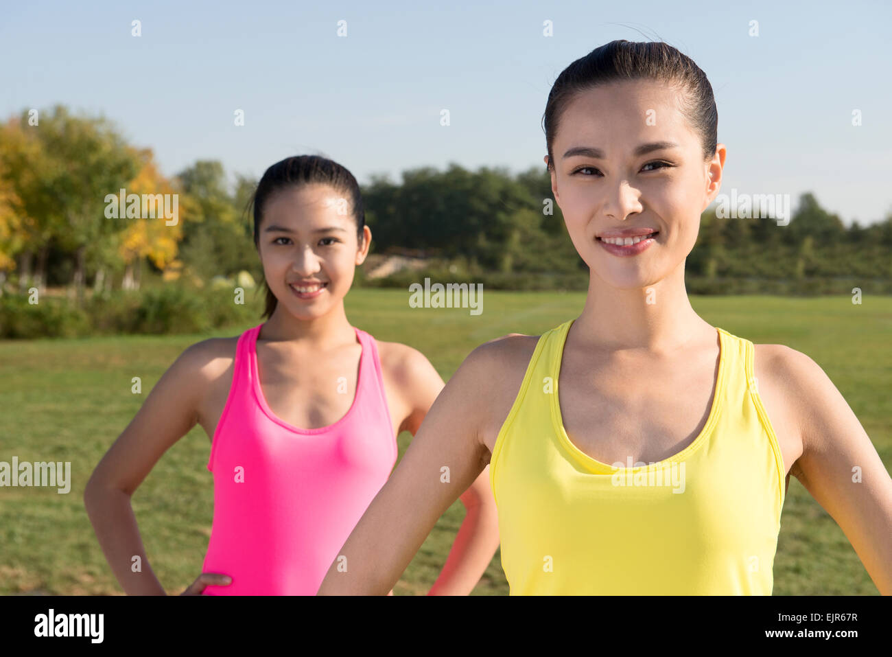 Portrait of young women exercising Stock Photo - Alamy