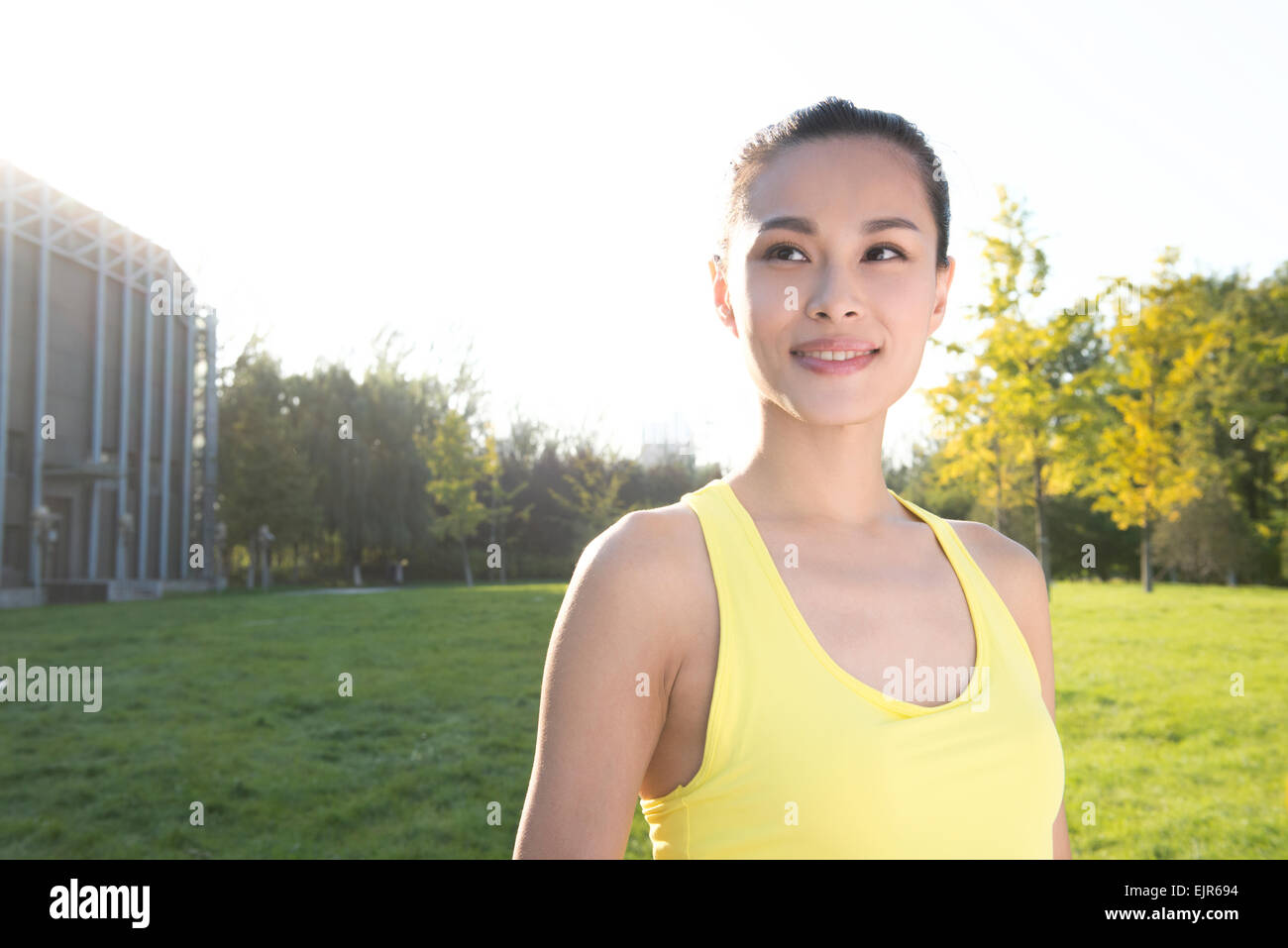 Portrait of young woman exercising Stock Photo - Alamy
