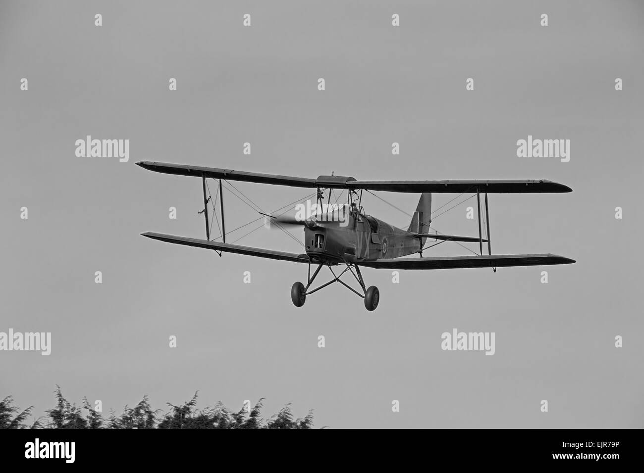 De Havilland DH82A Tiger Moth N6720 VX G-BYTN on final approach to land At Netherthorpe Airfield Stock Photo