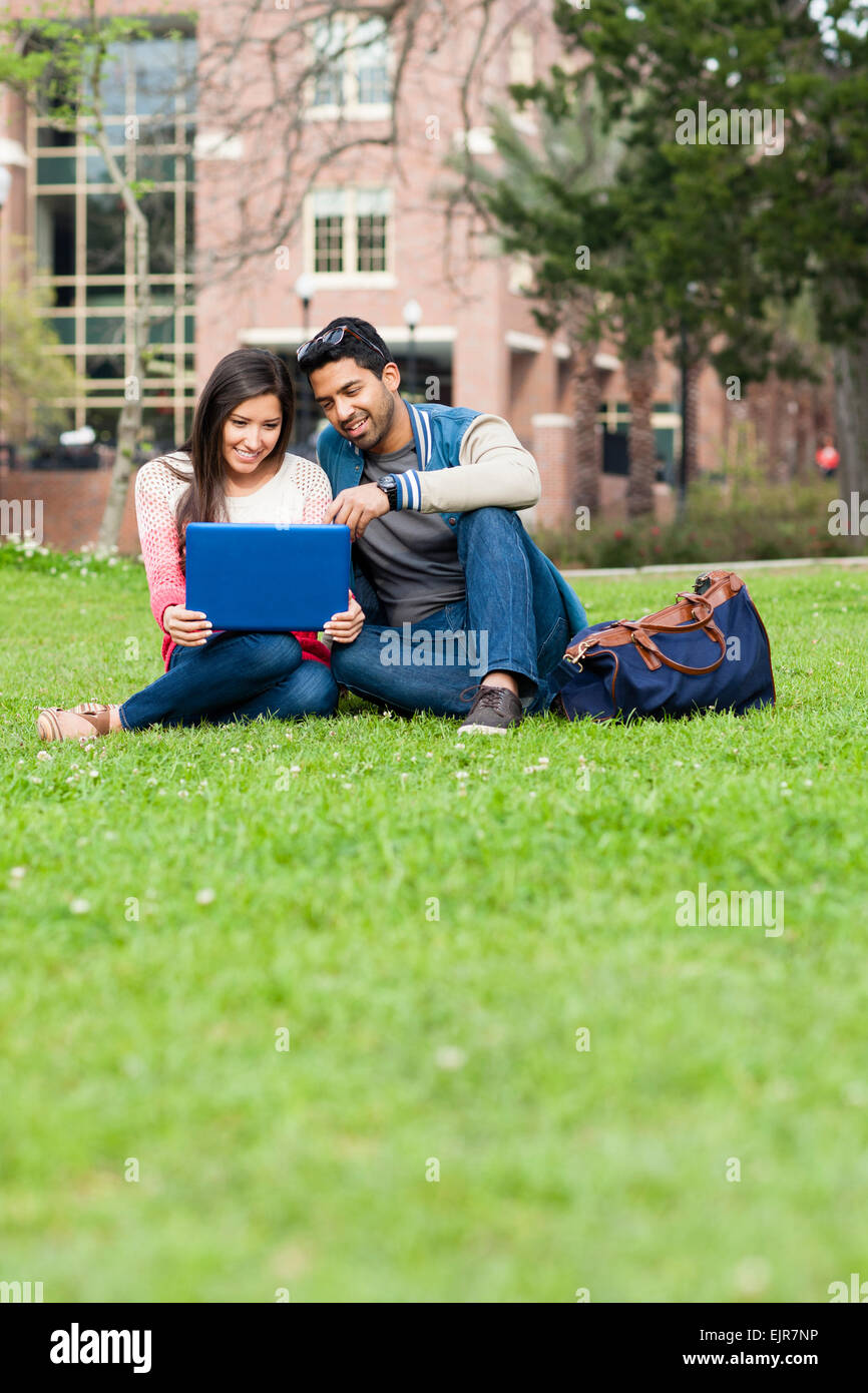 Students using laptop on campus Stock Photo Alamy