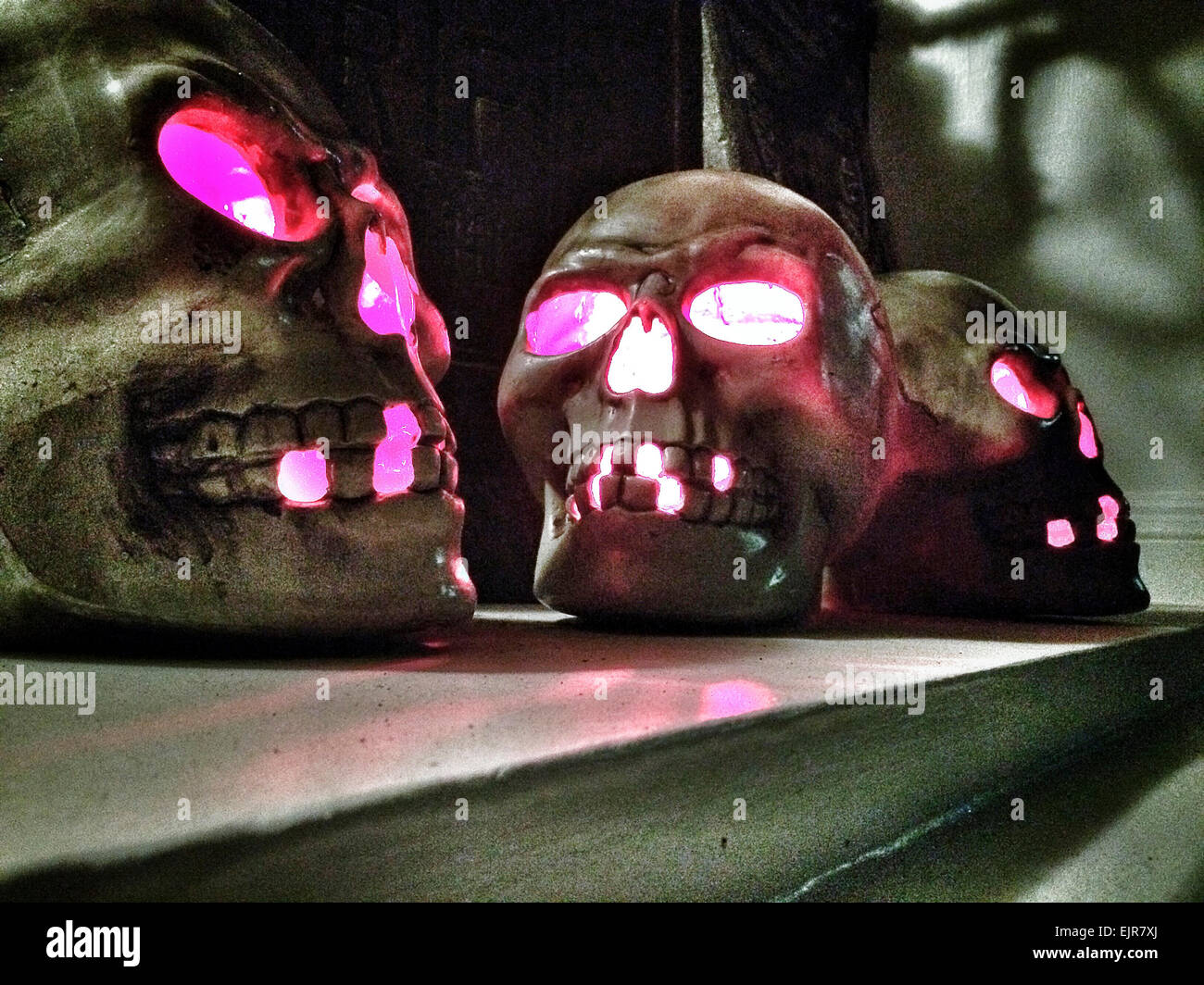 Close up of illuminated metal skulls - Smartphone Captured Stock Image